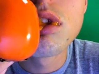 Me eating a persimmon