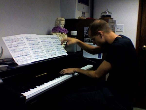 Michael Krzyzaniak Playing the piano at Orphean Sculptures